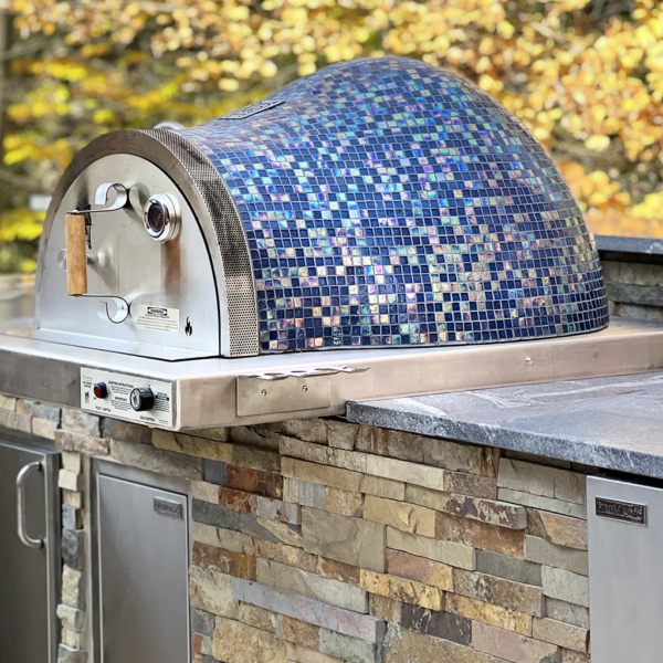 Outdoor Stone Kitchen With Firebrick Pizza Oven and Large Rotisserie bbq